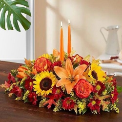 Delightful arrangement of gorgeous Flowers with 2 lovely Candles Delightful arrangement of gorgeous Flowers with 2 lovely Candles