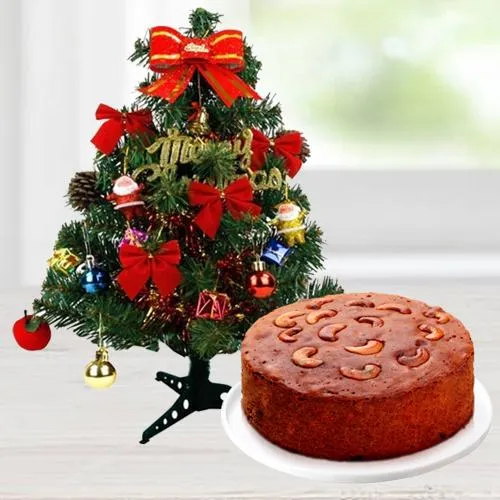 Christmas Gift of Nicely Wrapped 1 Ft Real looking artificial Christmas Tree with decorations like Bell, Star etc. & 1 Lbs. Plum/Fruit Cake.