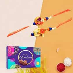 Lovely Rakhi celebration pack with Bhaiya Bhabhi Rakhi, free Roli tika and Chawal Lovely Rakhi celebration pack with Bhaiya Bhabhi Rakhi, free Roli tika and Chawal