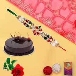Yummy chocolaty cake and rose with free Rakhi roli tilak and Chawal Yummy chocolaty cake and rose with free Rakhi roli tilak and Chawal