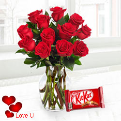 12 Red Roses in Vase with free Cadburys Chocolate...