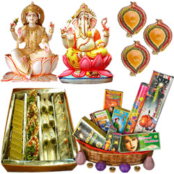 Lakshmi Ganesh Idols,Haldiram Assorted sweets, Crackers and Diya Lakshmi Ganesh Idols,Haldiram Assorted sweets, Crackers and Diya