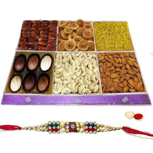 Zestful Marvel Dry Fruit and Chocolate Assemblage with One Rakhi and Roli Tilak Chawal Zestful Marvel Dry Fruit and Chocolate Assemblage with One Rakhi and Roli Tilak Chawal