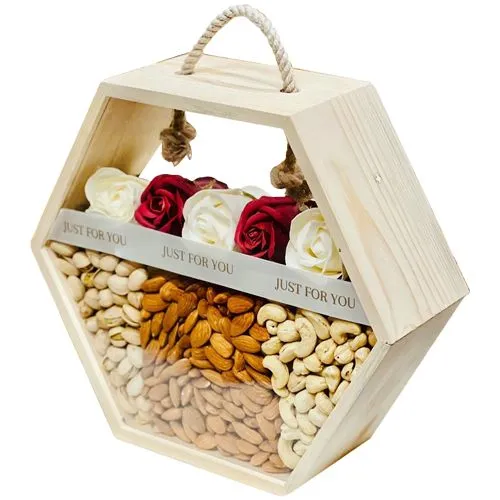 Crispy Dry Fruits in a Hexagonal Basket with Red Roses