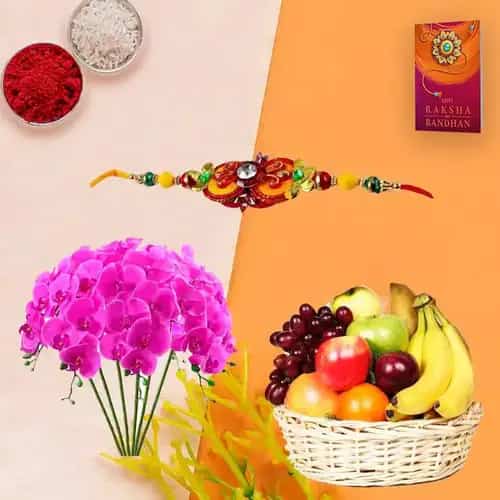 Tropical Fresh Fruits Basket decorated with Orchids with 1 Regular Rakhi and Roli Tilak Chawal Tropical Fresh Fruits Basket decorated with Orchids with 1 Regular Rakhi and Roli Tilak Chawal