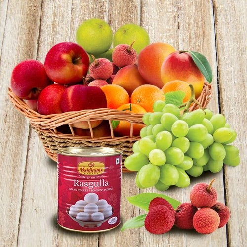 Moms special Fresh Fruits Basket with Haldiram Rasgulla Moms special Fresh Fruits Basket with Haldiram Rasgulla