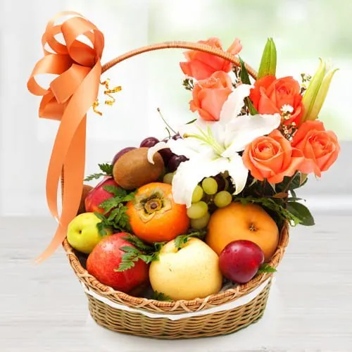 Beautiful Imported Fruits Basket with Orange Roses n White Lily