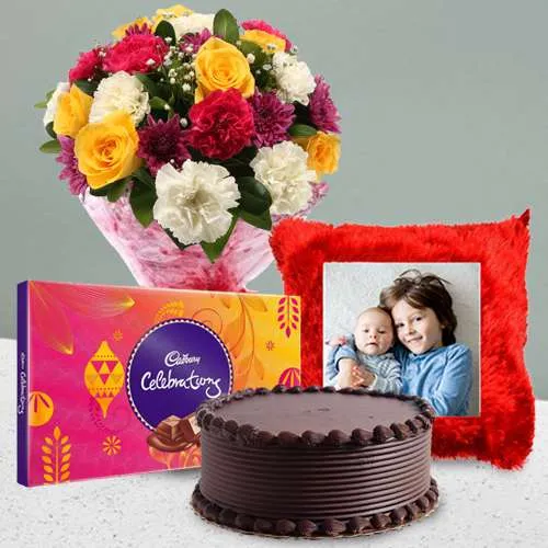 Awesome Personalized Cushion n Floral Bouquet with Cadbury Celebration n Cake	