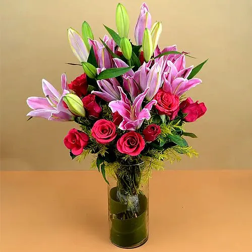 Unique Display of Pink Roses N Lilies in Vase