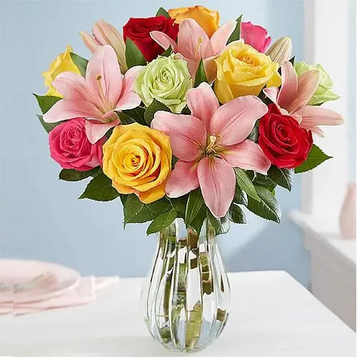 Bright Flower Bunch of Roses N Lilies in a Vase	