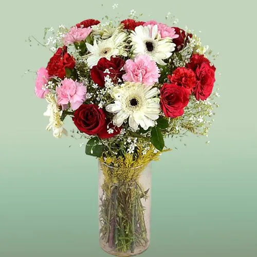 Designer Collection of Mixed Flower in a Glass Vase