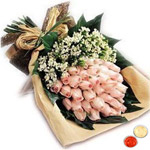 Bouquet of beautiful blushing peach or Pink Roses with free Roli Tilak and Chawal Bouquet of beautiful blushing peach or Pink Roses with free Roli Tilak and Chawal