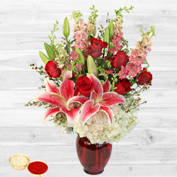 Magnificient bouquet of fresh Lilies with free Roli Tilak and Chawal Magnificient bouquet of fresh Lilies with free Roli Tilak and Chawal