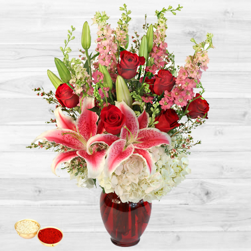 Magnificient bouquet of fresh Lilies with free Roli Tilak and Chawal Magnificient bouquet of fresh Lilies with free Roli Tilak and Chawal