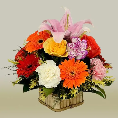 Distinctive Basket of Holiday Flowers Surprise