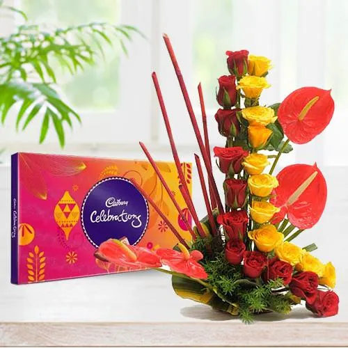 Amusing Anthurium N Roses Arrangement with Cadbury Celebration
