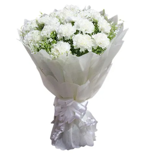 Deliver a delicate Online Bouquet of White Cranations in a tissue wrap