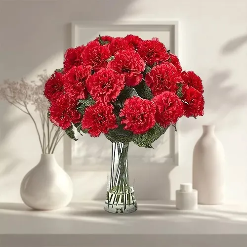 Now deliver these petite Red Carnations in a special glass vase