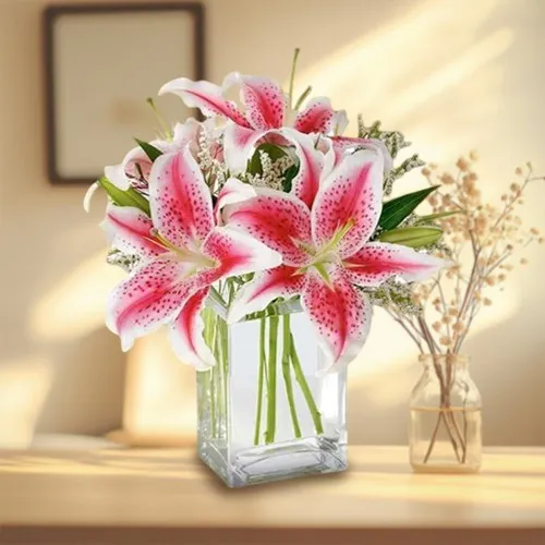 Fabulous Arrangement of Pink Lilies in a Glass Vase
