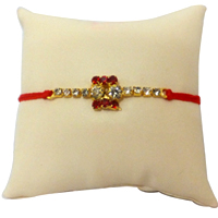 Amazing Gold Plated Rakhi Studded With Stones Amazing Gold Plated Rakhi Studded With Stones