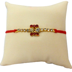 Amazing Gold Plated Rakhi Studded With Stones Amazing Gold Plated Rakhi Studded With Stones
