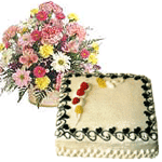 Special Gift Hamper containing mixed flowers Basket and 1lb cake Special Gift Hamper containing mixed flowers Basket and 1lb cake