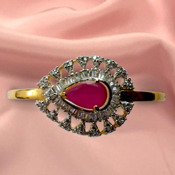 Beautiful Designer Red Stone and Rhinestone Studded Fancy bangle from Anjali Beautiful Designer Red Stone and Rhinestone Studded Fancy bangle from Anjali