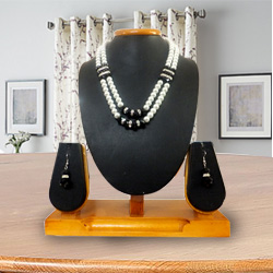 Designer Double Row Pearl Jewelry with American Diamonds and Black Stones Necklace Set with Matching Earrings Designer Double Row Pearl Jewelry with American Diamonds and Black Stones Necklace Set with Matching Earrings