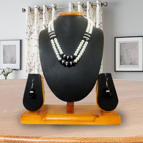 Designer Double Row Pearl Jewelry with American Diamonds and Black Stones Necklace Set with Matching Earrings Designer Double Row Pearl Jewelry with American Diamonds and Black Stones Necklace Set with Matching Earrings