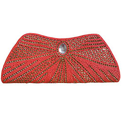 Seek Attention with Orange Clutch along Stone Work Seek Attention with Orange Clutch along Stone Work