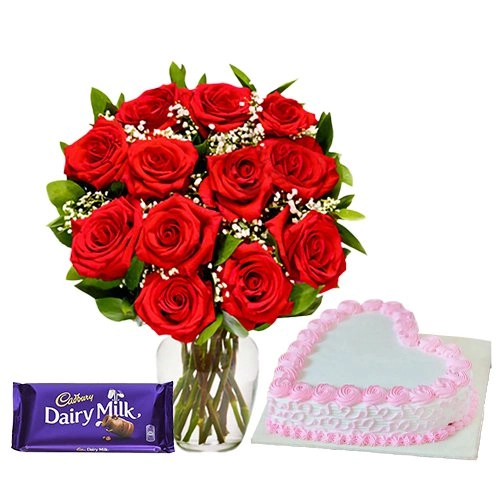 12 Exclusive Dutch Red Roses in vase and A Fresh Baked Heart Shaped Cake 1 Lb and a Cadburys Chocolate.