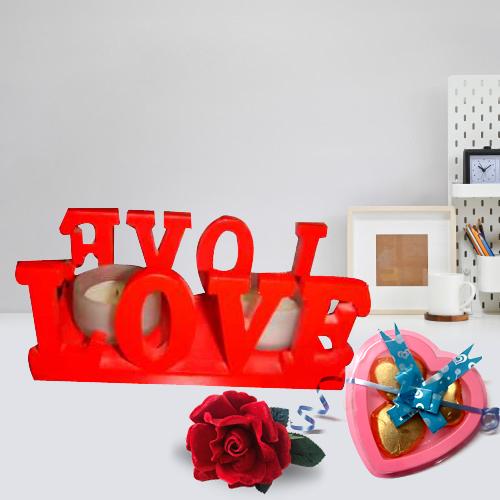 Love Candle Stand Gift with 2 Candles with a 3 pcs Heart Shaped Hand Made Chocolate & a Free Velvet Rose Love Candle Stand Gift with 2 Candles with a 3 pcs Heart Shaped Hand Made Chocolate & a Free Velvet Rose