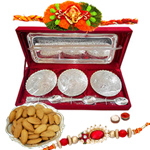 Silver plated set of bowls with a tray and spoons with Rakhi and Dry Fruit and Roli Tilak Chawal Silver plated set of bowls with a tray and spoons with Rakhi and Dry Fruit and Roli Tilak Chawal