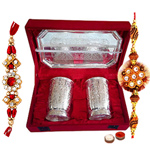 Silver plated set of design crafted two glasses and a tray with Rakhi and Roli Tilak Chawal Silver plated set of design crafted two glasses and a tray with Rakhi and Roli Tilak Chawal
