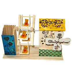 Extravagant Love Wooden Pen Stand with House and Wheel Swing Extravagant Love Wooden Pen Stand with House and Wheel Swing