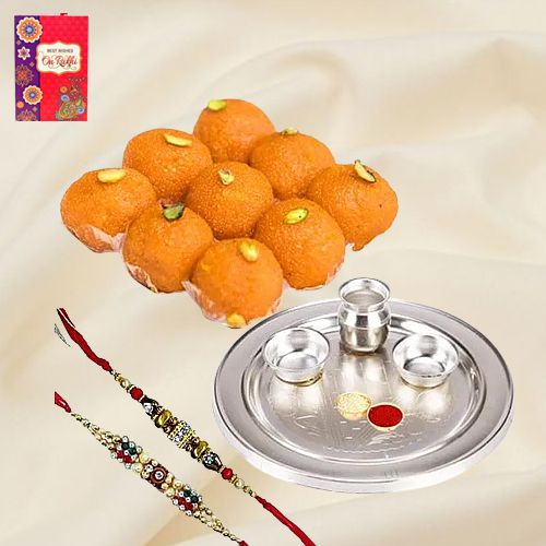 Pride-to-Possess Silver Plated Thali with <font color=#FF0000>Haldiram</font> Ghee Ladoo & 2 Designer Rakhi and Roli Tilak Chawal Pride-to-Possess Silver Plated Thali with <font color=#FF0000>Haldiram</font> Ghee Ladoo & 2 Designer Rakhi and Roli Tilak Chawal