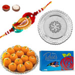 Elegant Rakhi Combo With Cadbury Roses , Moti Choor Ladoo And Silver Puja Thali Elegant Rakhi Combo With Cadbury Roses , Moti Choor Ladoo And Silver Puja Thali