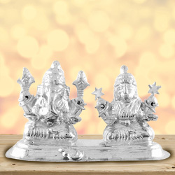 Divine looking silver plated Laxmi Ganesh idol Divine looking silver plated Laxmi Ganesh idol