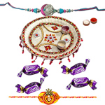 Decorated Pooja Thali with Free Nice Rakhi and Chocolates along with Roli Tilak and Chawal Decorated Pooja Thali with Free Nice Rakhi and Chocolates along with Roli Tilak and Chawal