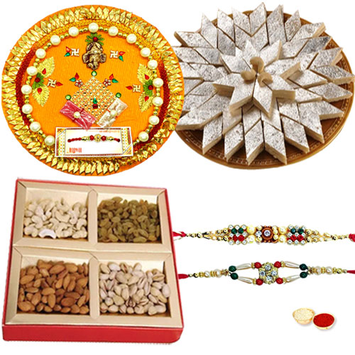 Exclusive Pooja thali with Kaju Katli, Dry Fruits and 2 free Rakhi, Roli Tika and Chawal Exclusive Pooja thali with Kaju Katli, Dry Fruits and 2 free Rakhi, Roli Tika and Chawal
