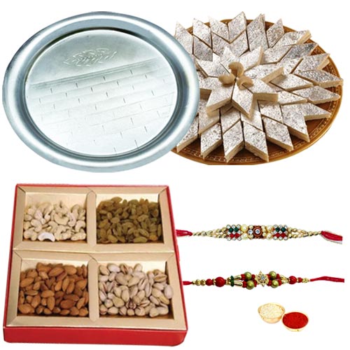 Smart-Looking Rakhi, Dry Fruits, Silver plated Thali and Kaju Katli for Sweet Memories Smart-Looking Rakhi, Dry Fruits, Silver plated Thali and Kaju Katli for Sweet Memories