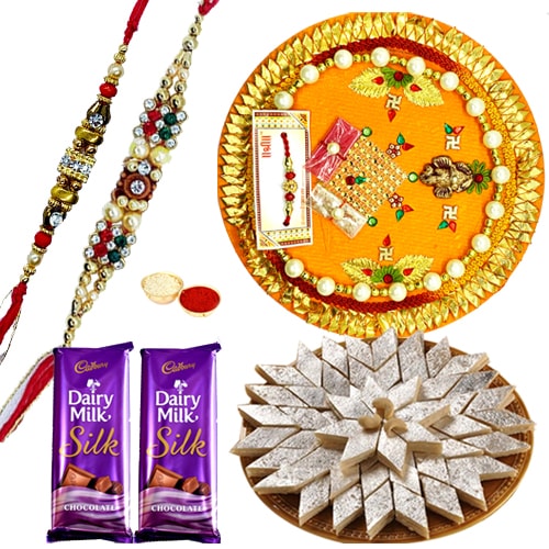 Wonderful Pooja Thali, Yummy Kaju Katli, Gift Voucher from Pantaloons with 2 free Rakhi, Roli Tilak and Chawal Wonderful Pooja Thali, Yummy Kaju Katli, Gift Voucher from Pantaloons with 2 free Rakhi, Roli Tilak and Chawal