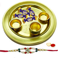 Fabulous Gift of 4 Choco Eclairs placed in a Adorable Silver Plated Thali Fabulous Gift of 4 Choco Eclairs placed in a Adorable Silver Plated Thali