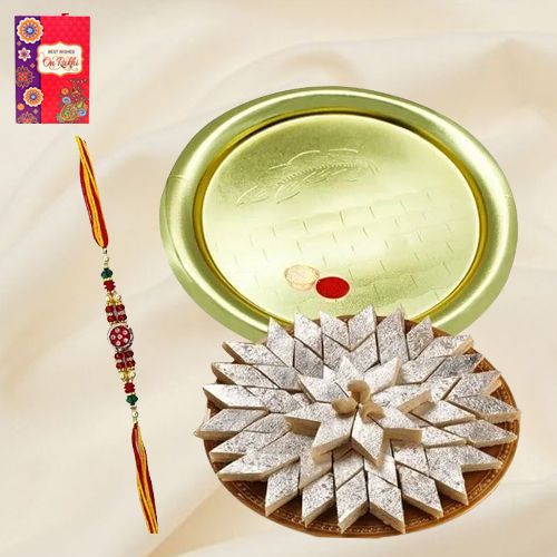 Kaju Katli and Silver Plated Puja Thali along Rakhi, Roli, Tilak and Chawal Kaju Katli and Silver Plated Puja Thali along Rakhi, Roli, Tilak and Chawal