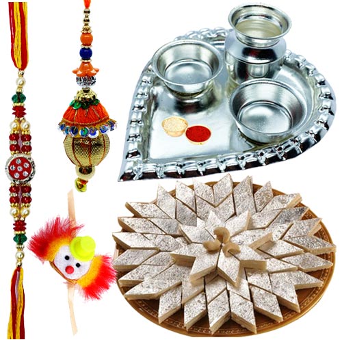 Holy Puja Aarti Thali with Kaju Katli and Rakhi Holy Puja Aarti Thali with Kaju Katli and Rakhi