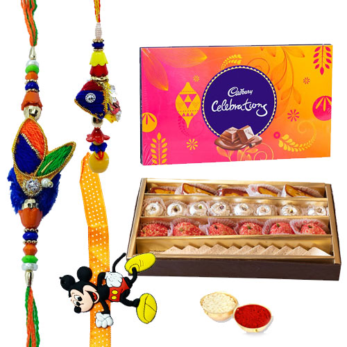 Lovely Gift of Well Prepared <font color=#FF0000>Haldiram</font>s Sweets and a Pack of Divine Cadbury Celebration Lovely Gift of Well Prepared <font color=#FF0000>Haldiram</font>s Sweets and a Pack of Divine Cadbury Celebration