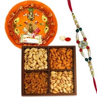 Auspicious Celebration Special Rakhi, Pooja Thali with Dry Fruits Auspicious Celebration Special Rakhi, Pooja Thali with Dry Fruits