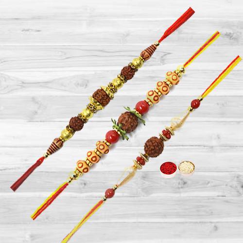 Exquisite Rudraksha Rakhi with Trio Offer Exquisite Rudraksha Rakhi with Trio Offer