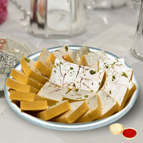 Toothsome Kaju Kesar Katli from Haldiram with free Roli Tilak and Chawal. Toothsome Kaju Kesar Katli from Haldiram with free Roli Tilak and Chawal.