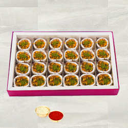 Kaju Pista Premium Sweets from Haldiram with free Roli Tilak and Chawal. Kaju Pista Premium Sweets from Haldiram with free Roli Tilak and Chawal.